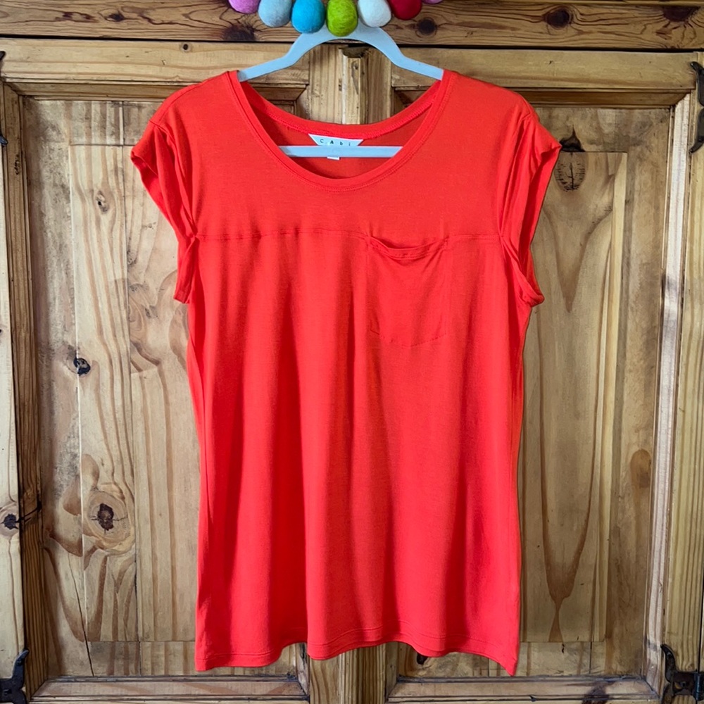 Cabi orange scoop neck short sleeve pocket tee. Size Small